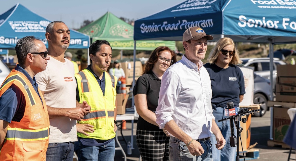 GO-Serve Director Josh Fryday joins food bank to distribute food at Snapdragon Stadium in San Diego
